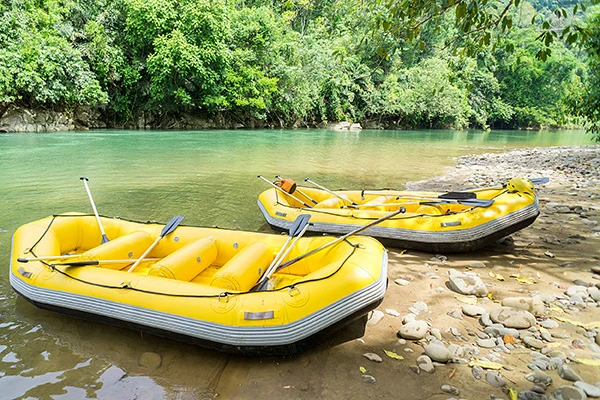 Two rafts resting on the riverbank